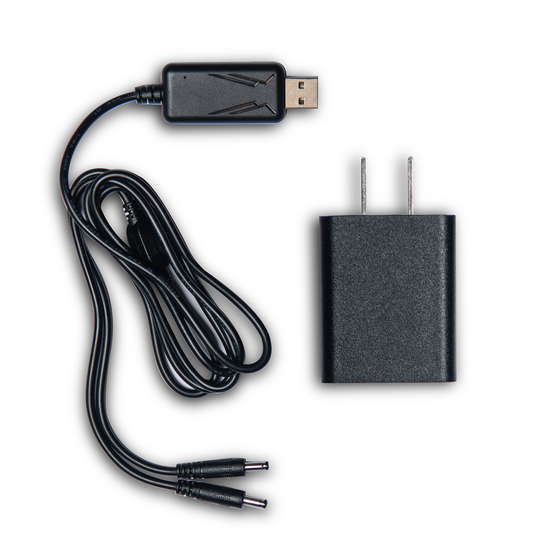 USB cable, US plug power adapter, and DC connector on a white background